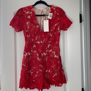 New with tags, red lace romper from LUSH